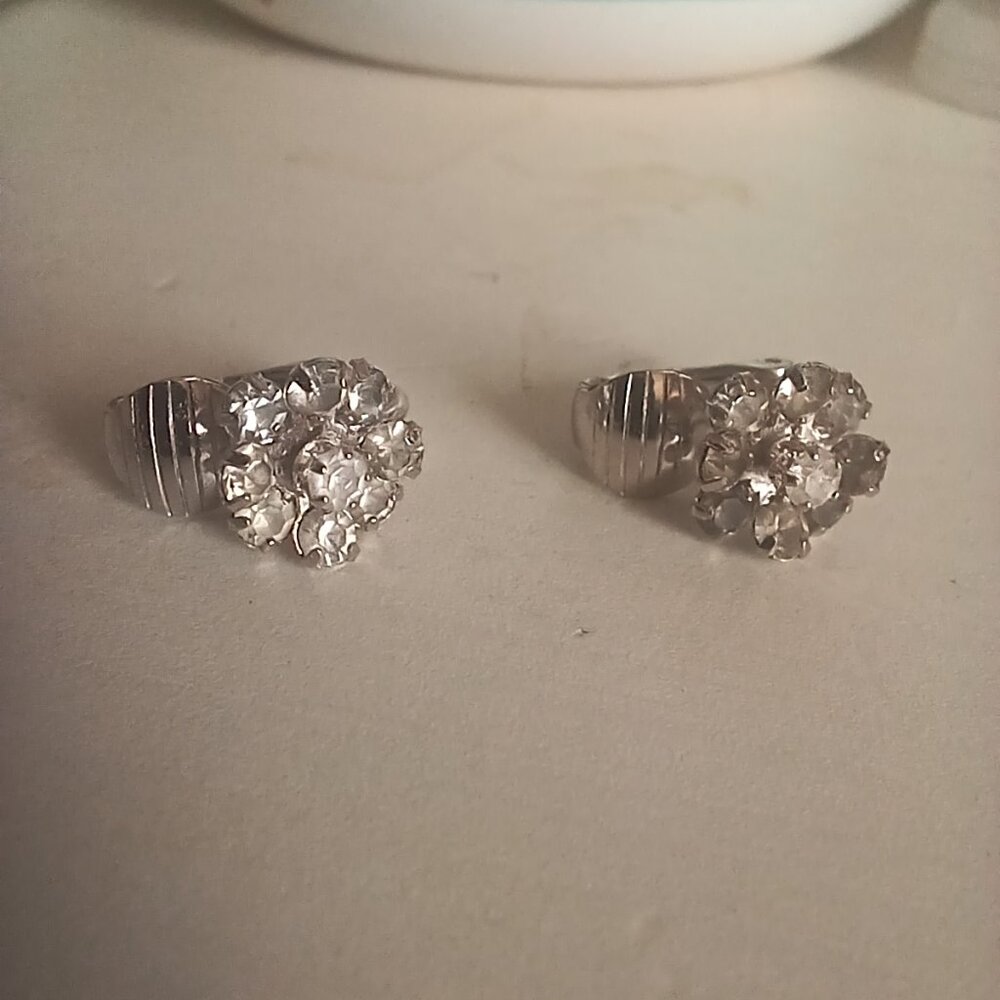 Dainty clip on floral rhinestone earrings. Vintage Avon.